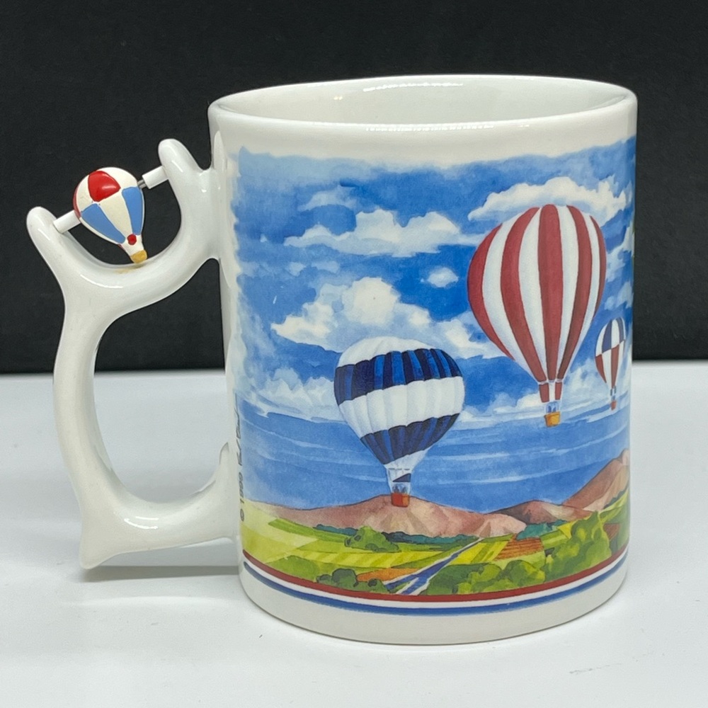 Spinners Coffee Mug 1999 Hot Air Balloon Design Paul Brent 11 oz